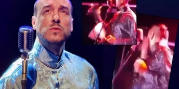 Cem Adrian, yüzüne atılan pet şişeye rağmen sahnedeki performansını sürdürdü