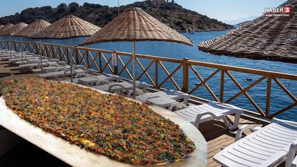 Bodrum'daki halk plajı yoğun ilgi görüyor: Giriş ücretsiz, lahmacun 125 TL Bodrum'daki halk plajı yoğun ilgi görüyor.